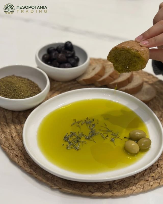 Olive oil served with olives, za’atar and bread