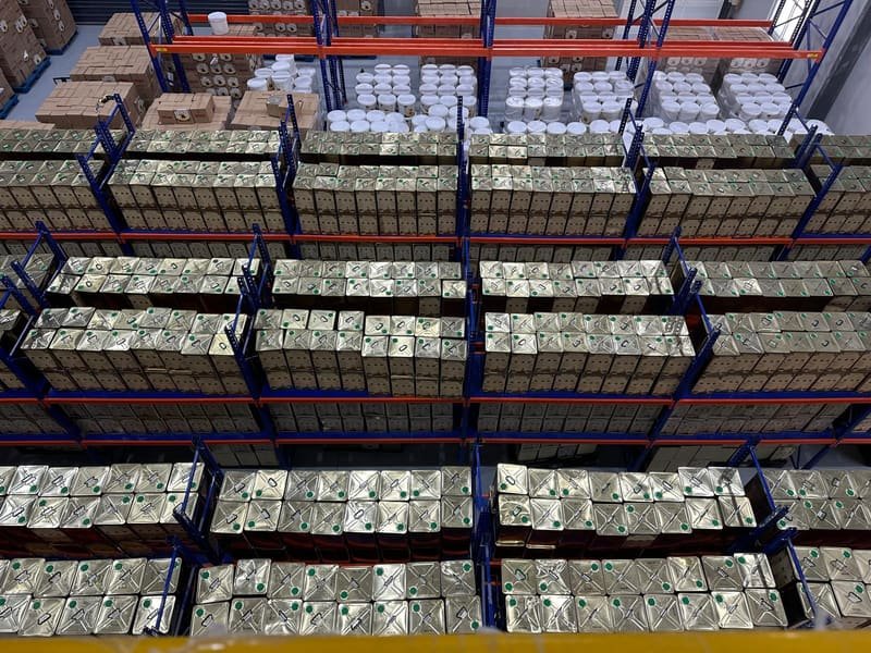 Wide view of the warehouse floor at shift start